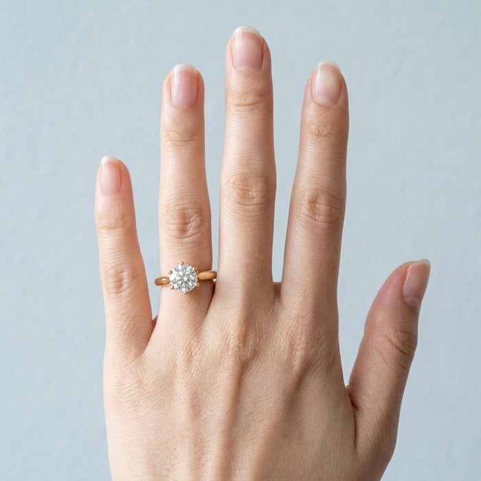 Cecilia engagement ring worn on the ring finger - Minted Jewellery