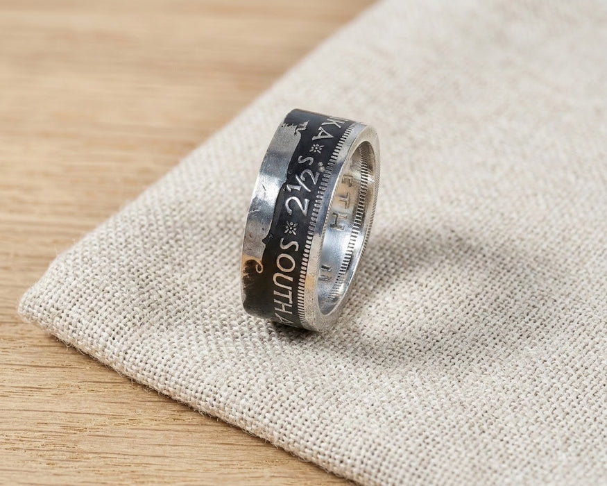 South Africa 2 1/2 Shillings coin ring resting on linen - Minted Jewellery