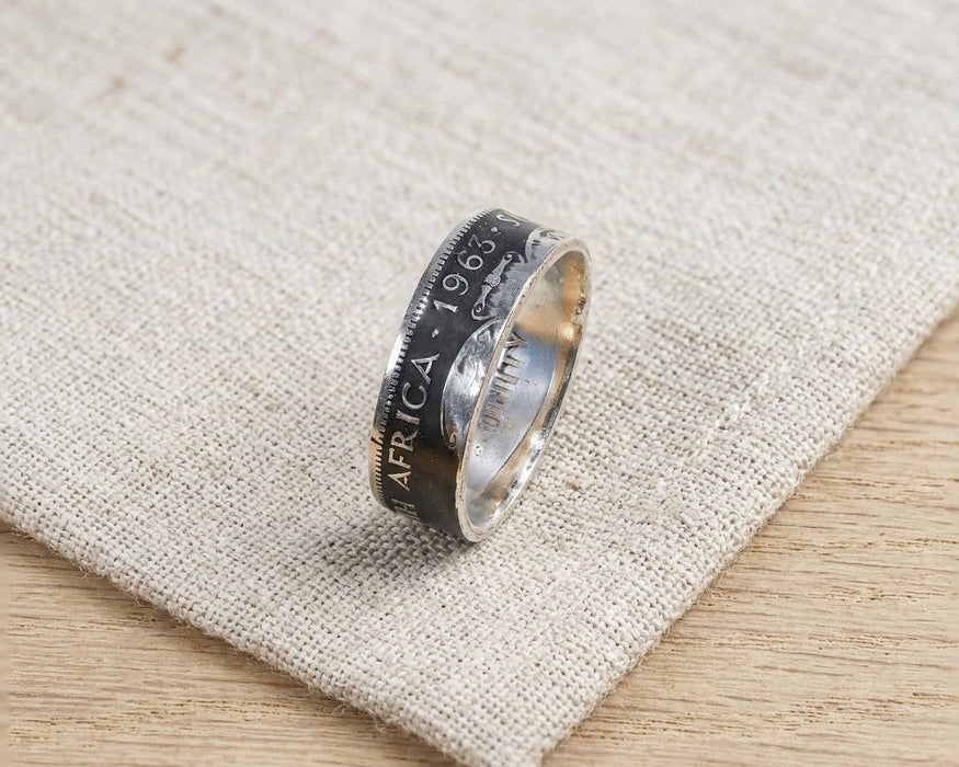 South Africa 20c coin ring resting on linen - Minted Jewellery