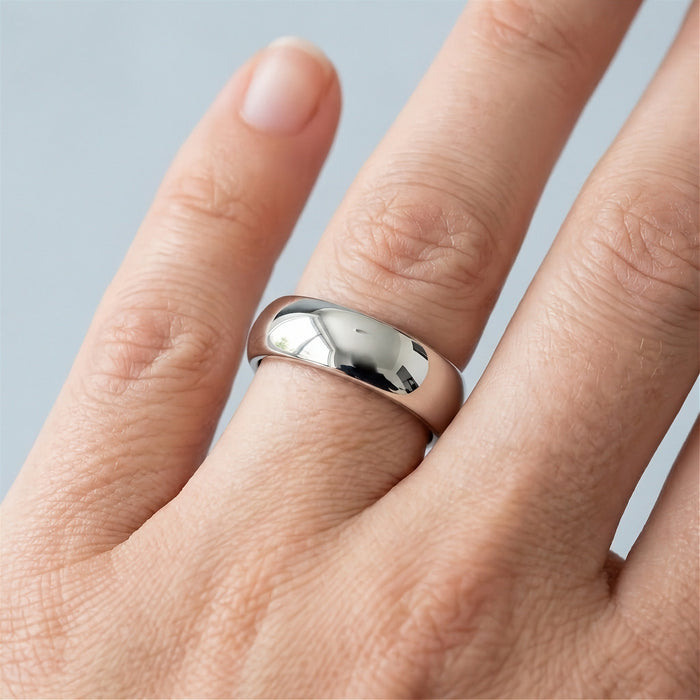 D-band sterling silver ring worn on a finger - Minted Jewellery