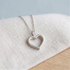 Heart sterling silver necklace on linen - Minted Jewellery