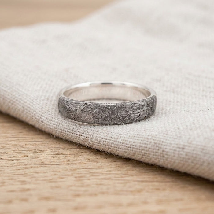 Mens Muonionalusta meteorite ring resting on linen - Minted Jewellery