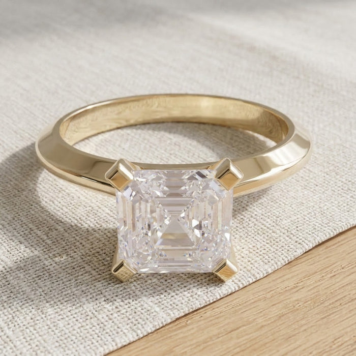 Octavia engagement ring resting on linen - Minted Jewellery