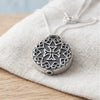 Sterling silver oxidised locket on linen - Minted Jewellery