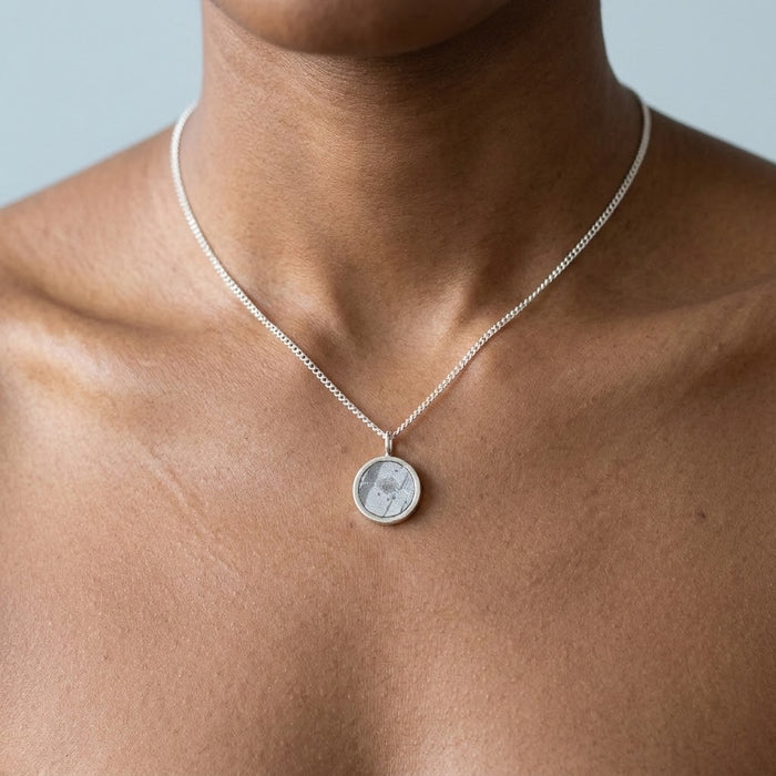 Round meteorite necklace worn at the collarbone - Minted Jewellery