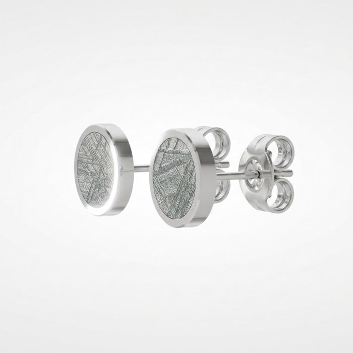 Side view of the round Muonionalusta meteorite stud earrings in sterling silver, with butterfly backs - Minted Jewellery