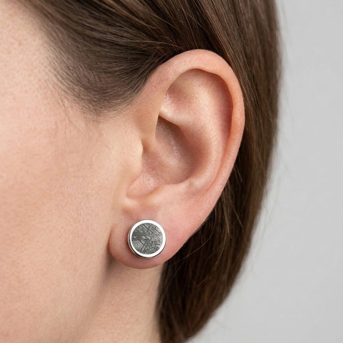 Round Muonionalusta meteorite stud earring in sterling silver, worn on the earlobe - Minted Jewellery