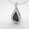 Back of the Seymchan meteorite teardrop pendant, with its open window - Minted Jewellery