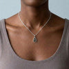 Seymchan meteorite teardrop necklace in silver, worn at the collarbone - Minted Jewellery