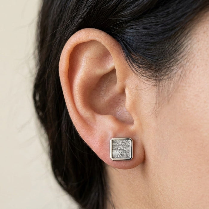 Square Muonionalusta meteorite stud earring in sterling silver, worn on the earlobe - Minted Jewellery