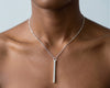 Vertical silver bar necklace worn at the collarbone - Minted Jewellery